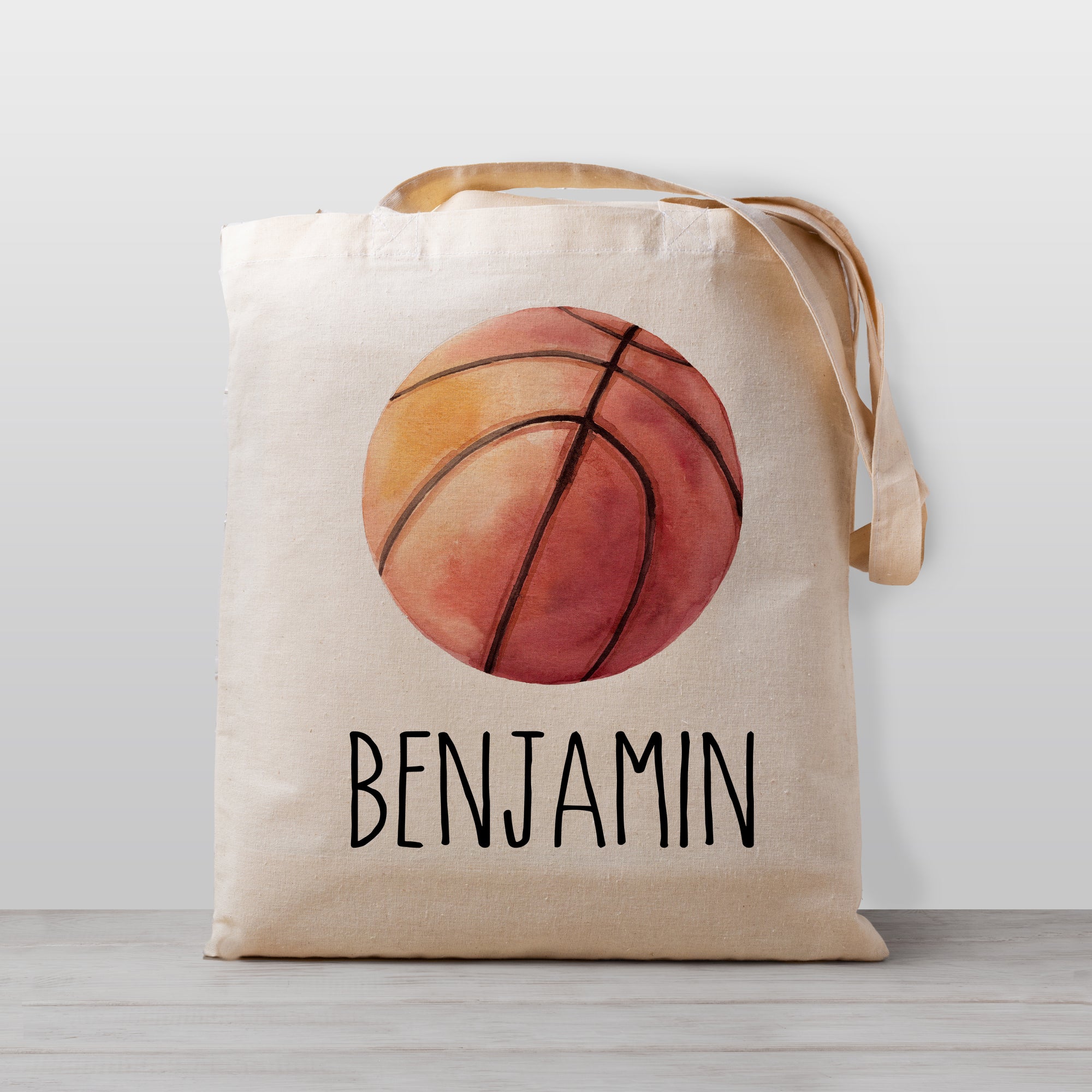 A cute basketball tote bag, Personalized with your child's name. Perfect for carrying your little one's stuff to preschool, daycare, the library, or bringing favorite books over to Grandma's house. 