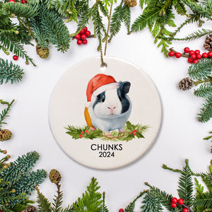 A special ornament for a special guinea pig. This is ceramic and includes a name and date for a gray and white