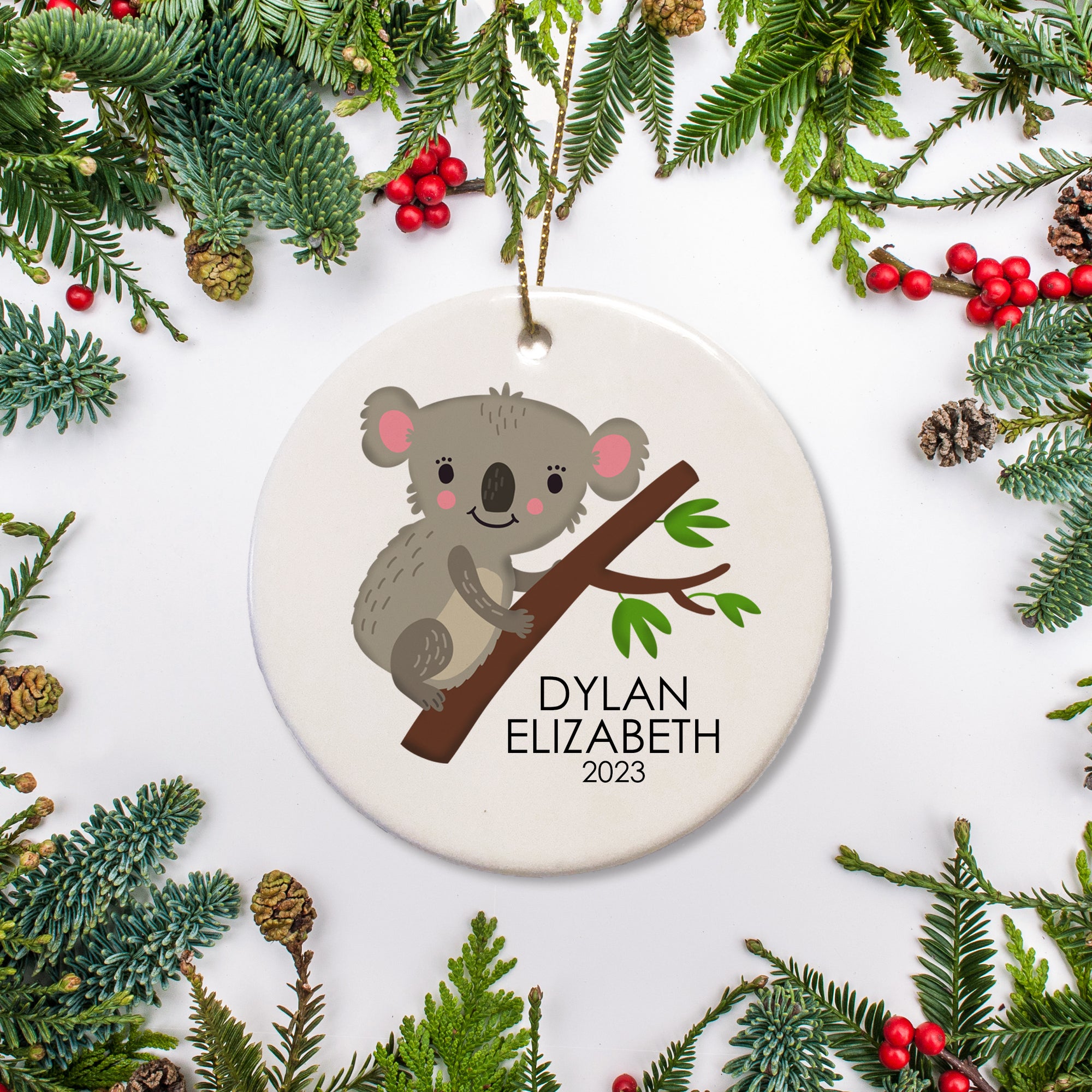 Koala Bear Christmas ornament, personalized with your child's name and the year. Option to include a personal message on the back, ceramic, comes with gold hanging string and a free gift box