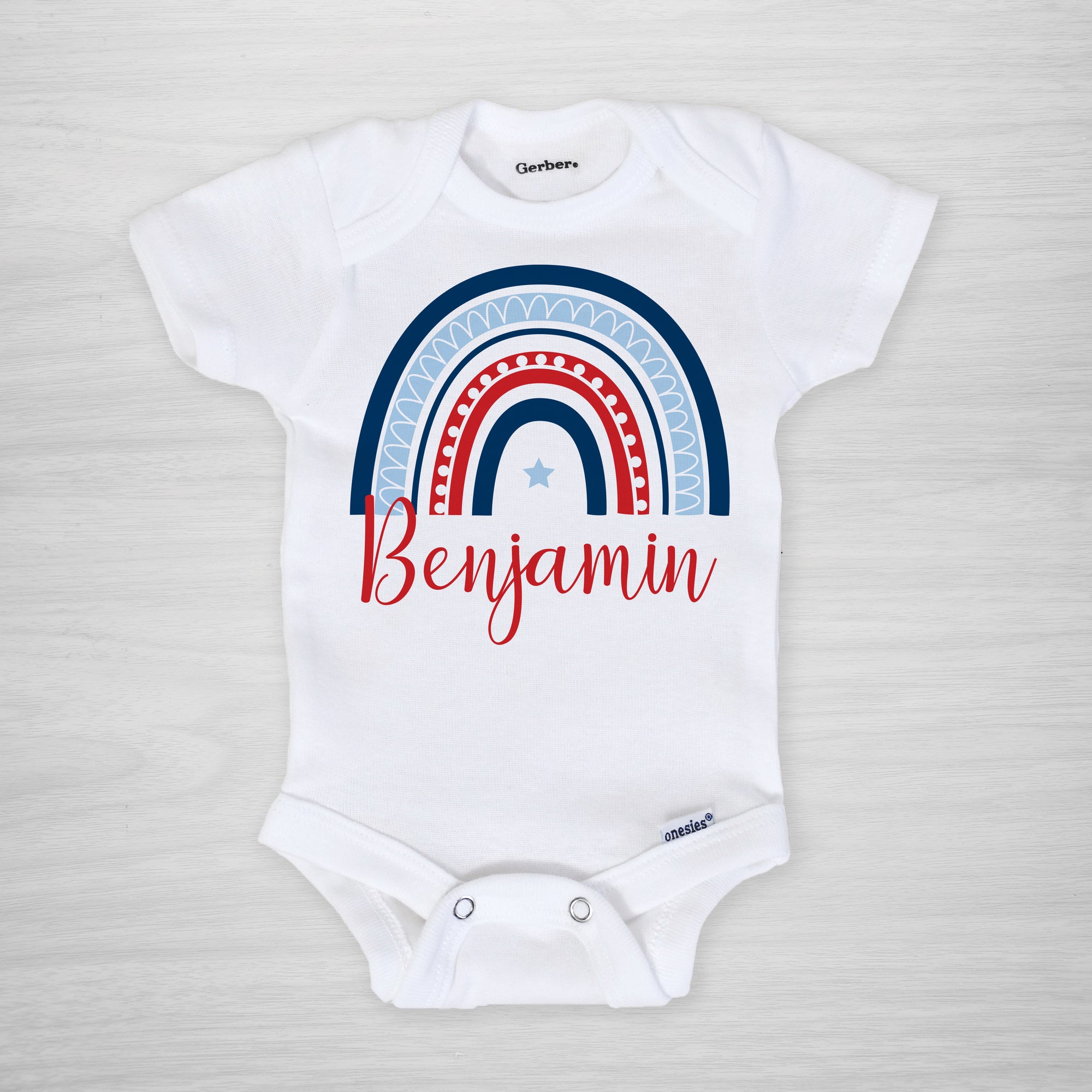 personalized 4th of july onesie with a modern rainbow in red, white and blue, short sleeved
