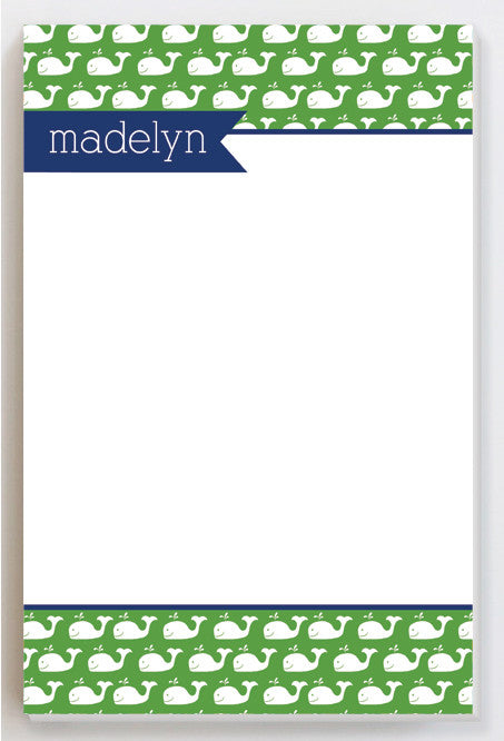 Whales on green with blue banner notepad