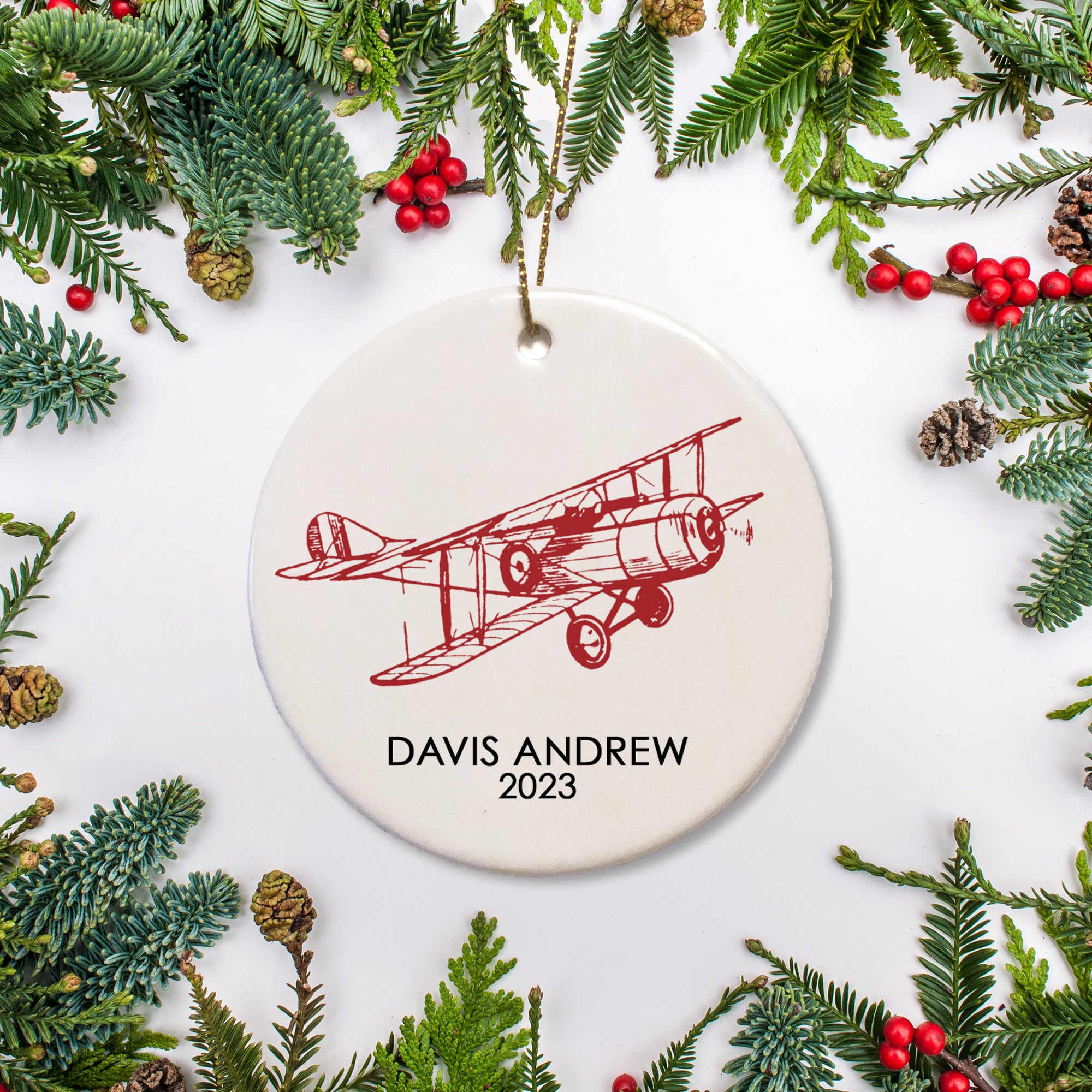 Vintage Airplane Personalized Christmas ornament sketched in red with name and year of your choice. Comes with gold string for hanging | PIPSY.COM