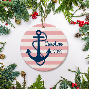 Nautical Christmas Ornament, in pink and navy, personalized with a name and the  year. Ceramic ornament on gold string with a free gift box