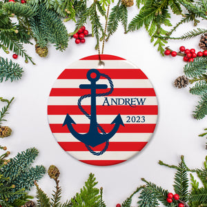 Nautical Christmas Ornament, in red and navy, personalized with a name and the  year. Ceramic ornament on gold string with a free gift box
