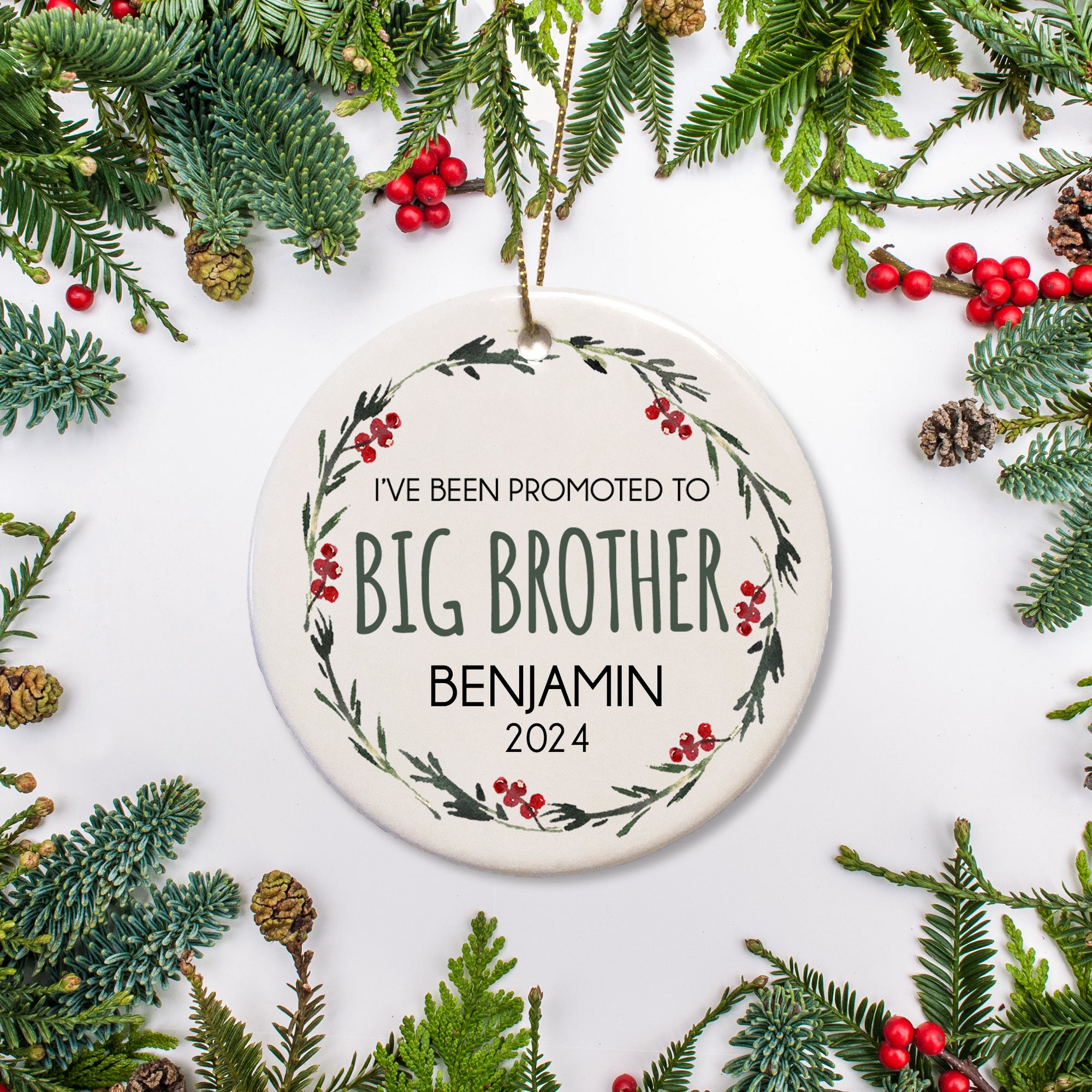 Celebrate the promotion of your son to big brother! Personalized with name and year of your choice surrounded by a simple holiday wreath. | PIPSY.COM