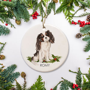 This custom Christmas ornament boasts your precious Cavalier King Charles pooch, along with your dog's name! It's a delightful present for any dog lover or way to celebrate your fur baby's first Christmas.