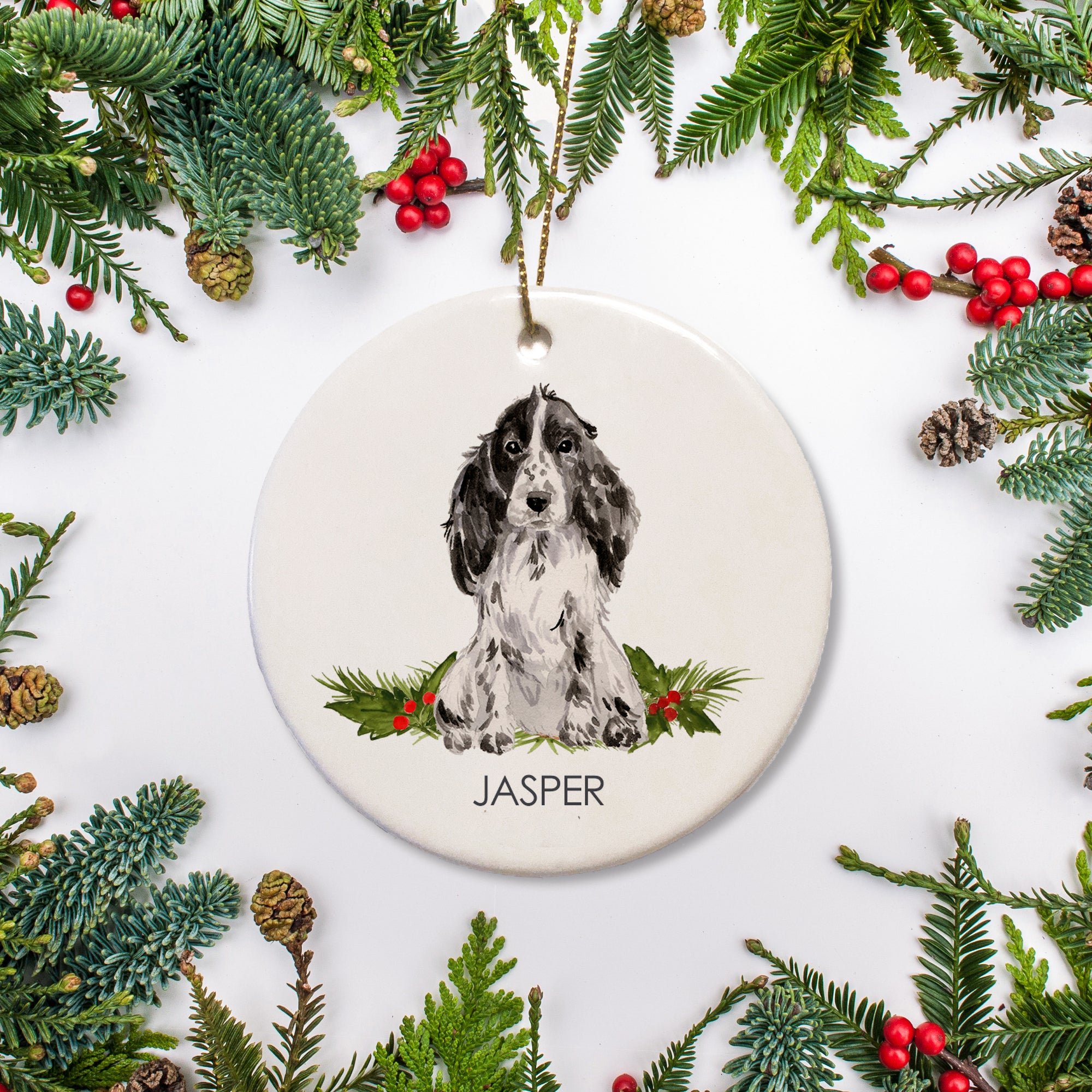 This personalized Christmas ornament features a black and white cocker spaniel, personalized with your dog's name. You can add a special message to the back of hte ornament, too. Makes a great gift!