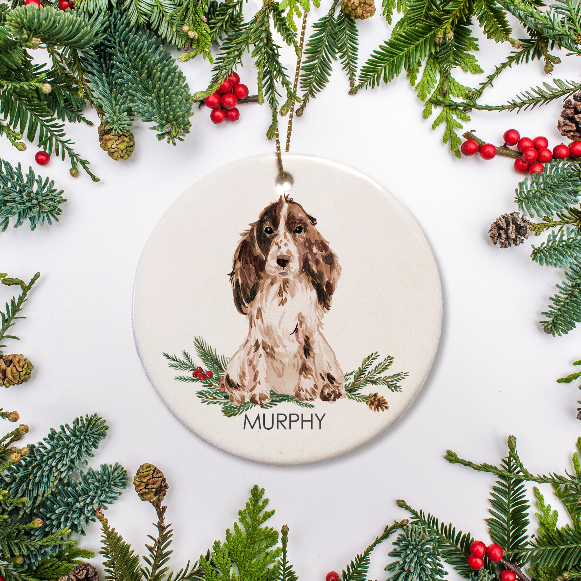 This personalized ornament features a brown Cocker Spaniel, personalized with your dog's name. You can add a special text message to the back of the ornament (a year, adoption date, or special quote). Makes a great gift!