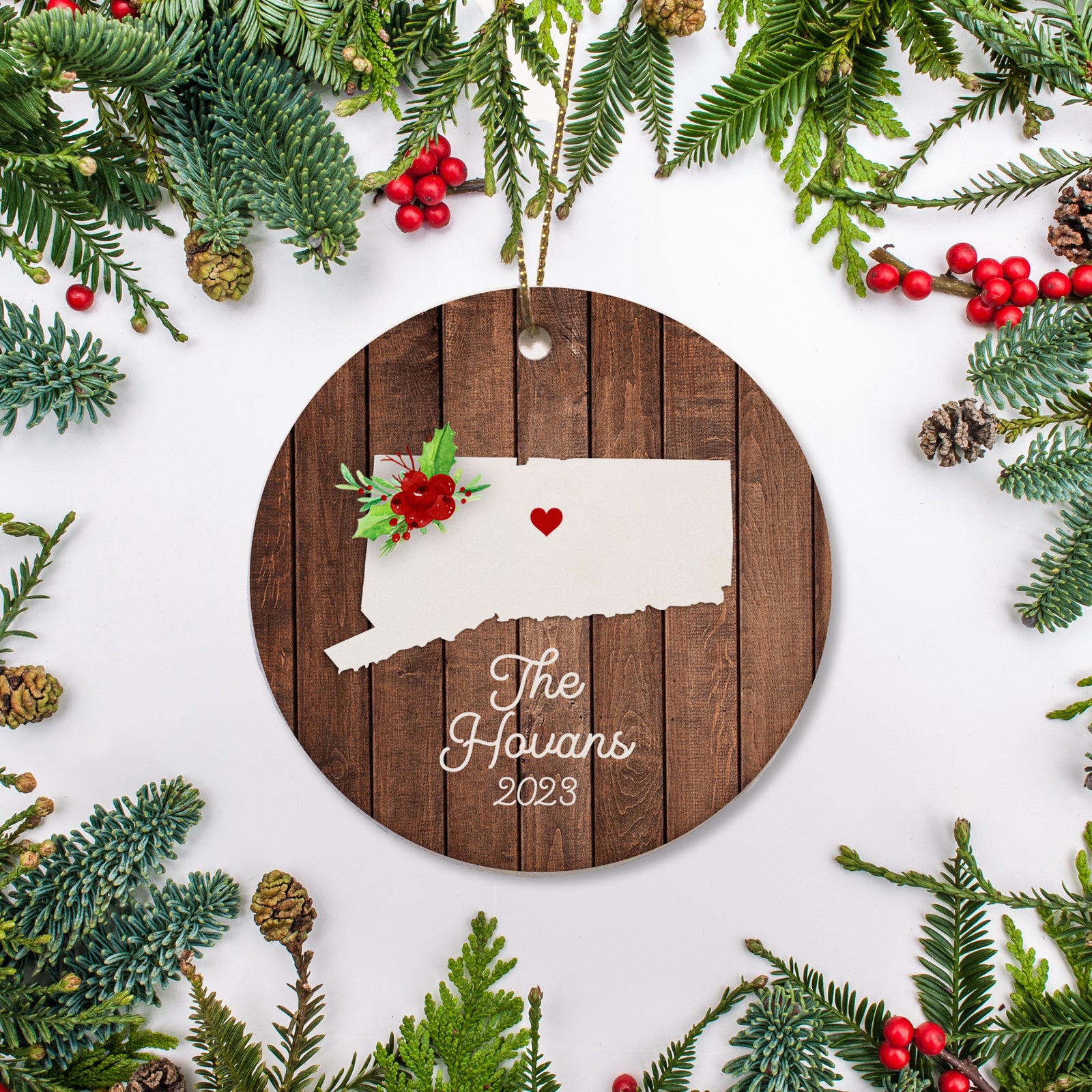 Connecticut state christmas ornament. Personalized with your name, city, and year. Ceramic keepsake ornament with a gold hanging string. Great for a college student, new home owners, just moved, or vacation memory