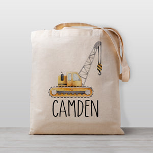 A cute personalized crane construction tote bag, perfect for carrying your little one's stuff to preschool, kindergarten, or to use as a library book bag.