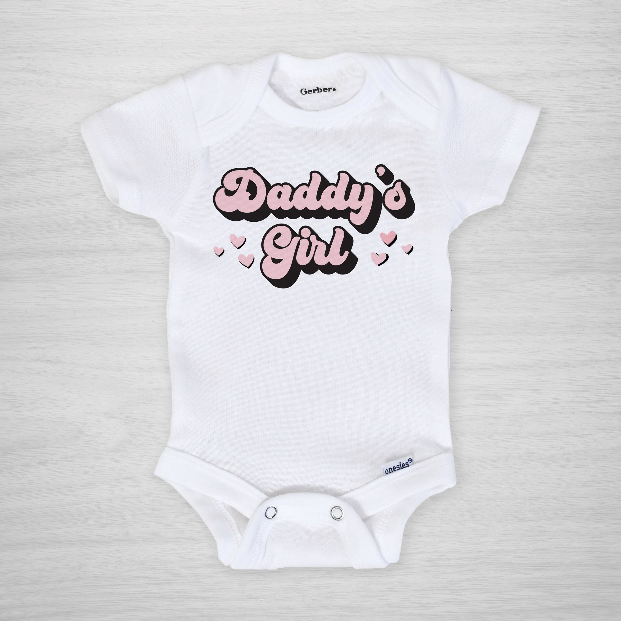 Let your little one show off their daddy pride with this special Daddy's Girl Onesie®! This comfy onesie is perfect for Daddy's Girl on Father's Day or any day! It's sure to bring a smile to dad’s face. (And if it doesn't, it's at least an adorable photo opp!)