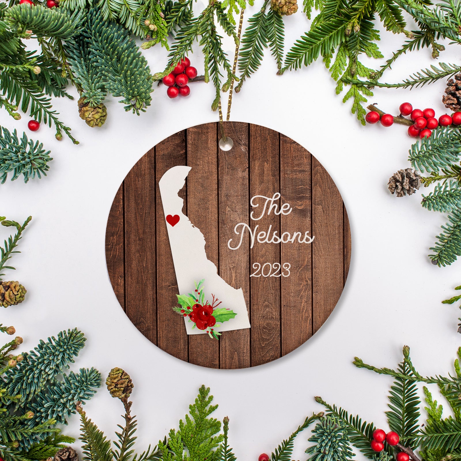 Delaware state christmas ornament. Personalized with your name, city, and year. Ceramic keepsake ornament with a gold hanging string. Great for a college student, new home owners, just moved, or vacation memory