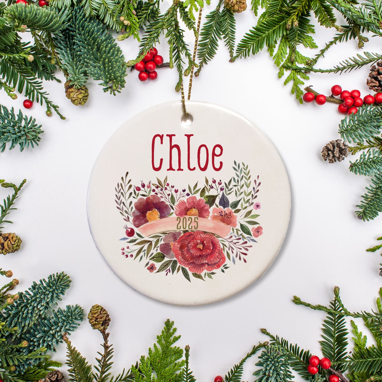 Floral Bunch Keepsake Christmas Ornament Festive floral bunch with banner displaying the year across the bunch. Name across the top.| Pipsy.com