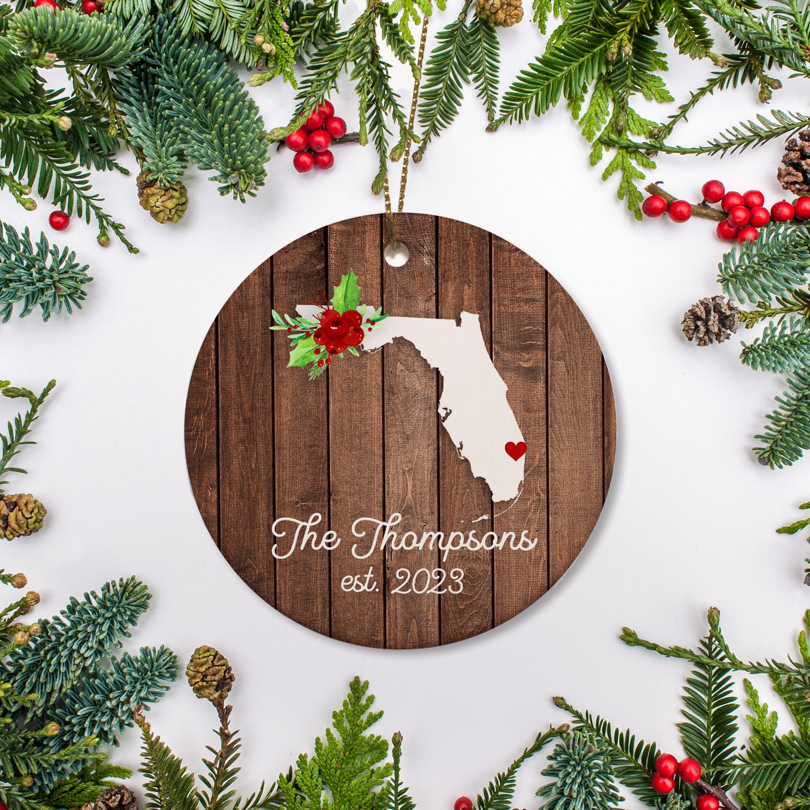 Florida state christmas ornament. Personalized with your name, city, and year. Ceramic keepsake ornament with a gold hanging string. Great for a college student, new home owners, just moved, or vacation memory