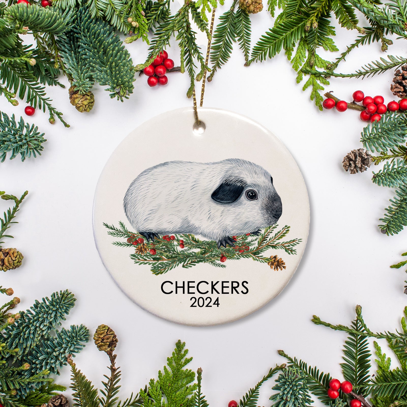 A special ornament for a special guinea pig. This is ceramic and includes a name and date for a Californian guinea pig