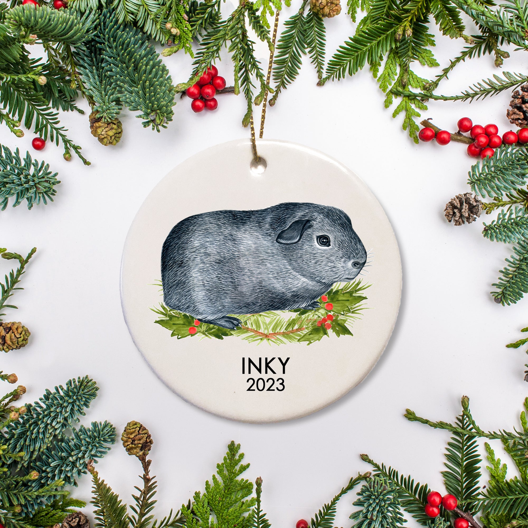 A special ornament for a special guinea pig. This is ceramic and includes a name and date for a  Agouti guinea pig