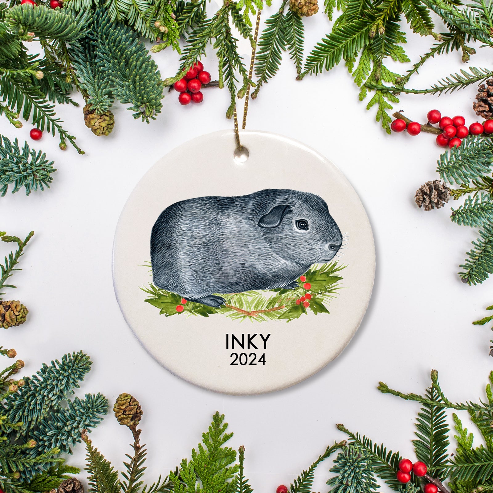 A special ornament for a special guinea pig. This is ceramic and includes a name and date for a Agouti guinea pig