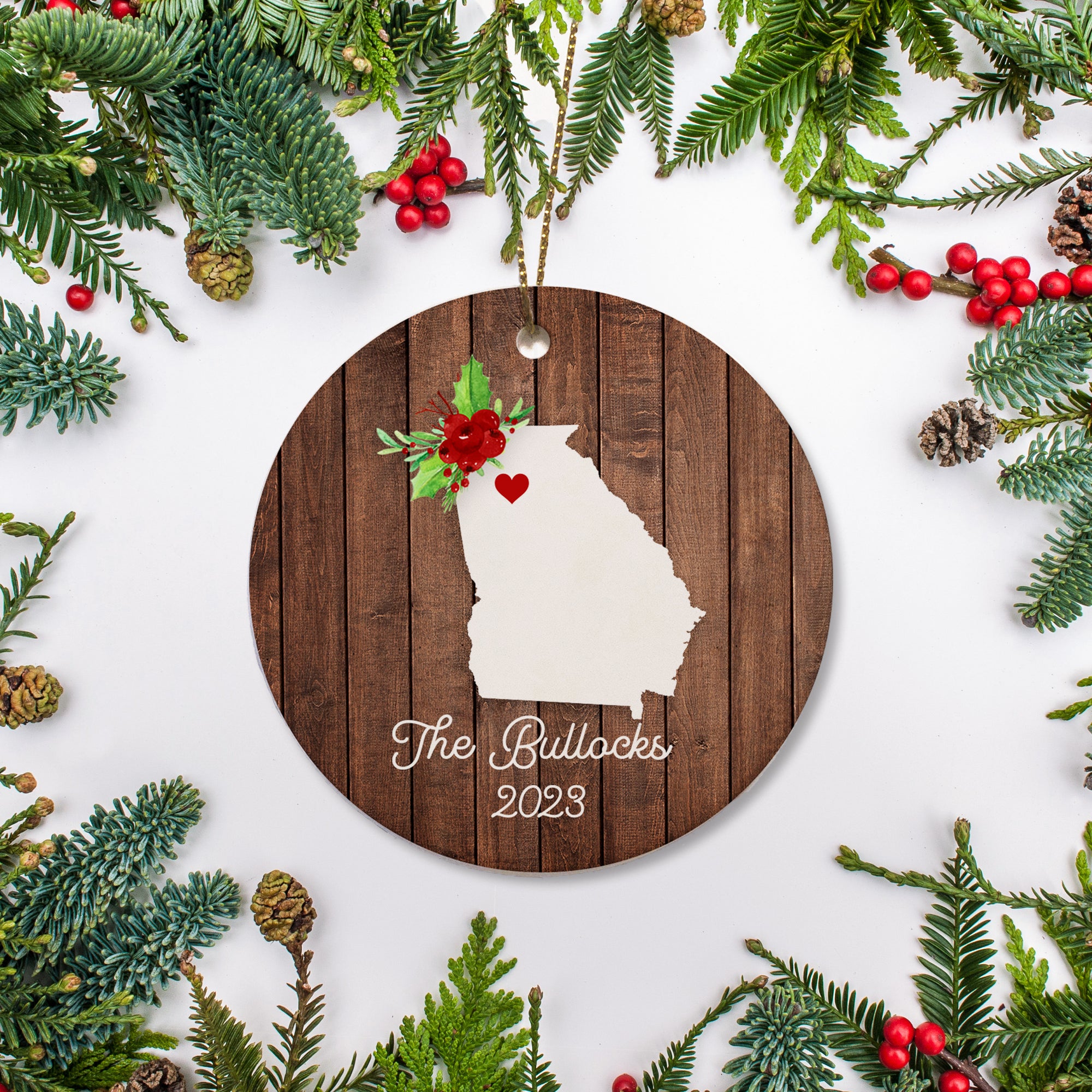 Georgia state christmas ornament. Personalized with your name, city, and year. Ceramic keepsake ornament with a gold hanging string. Great for a college student, new home owners, just moved, or vacation memory