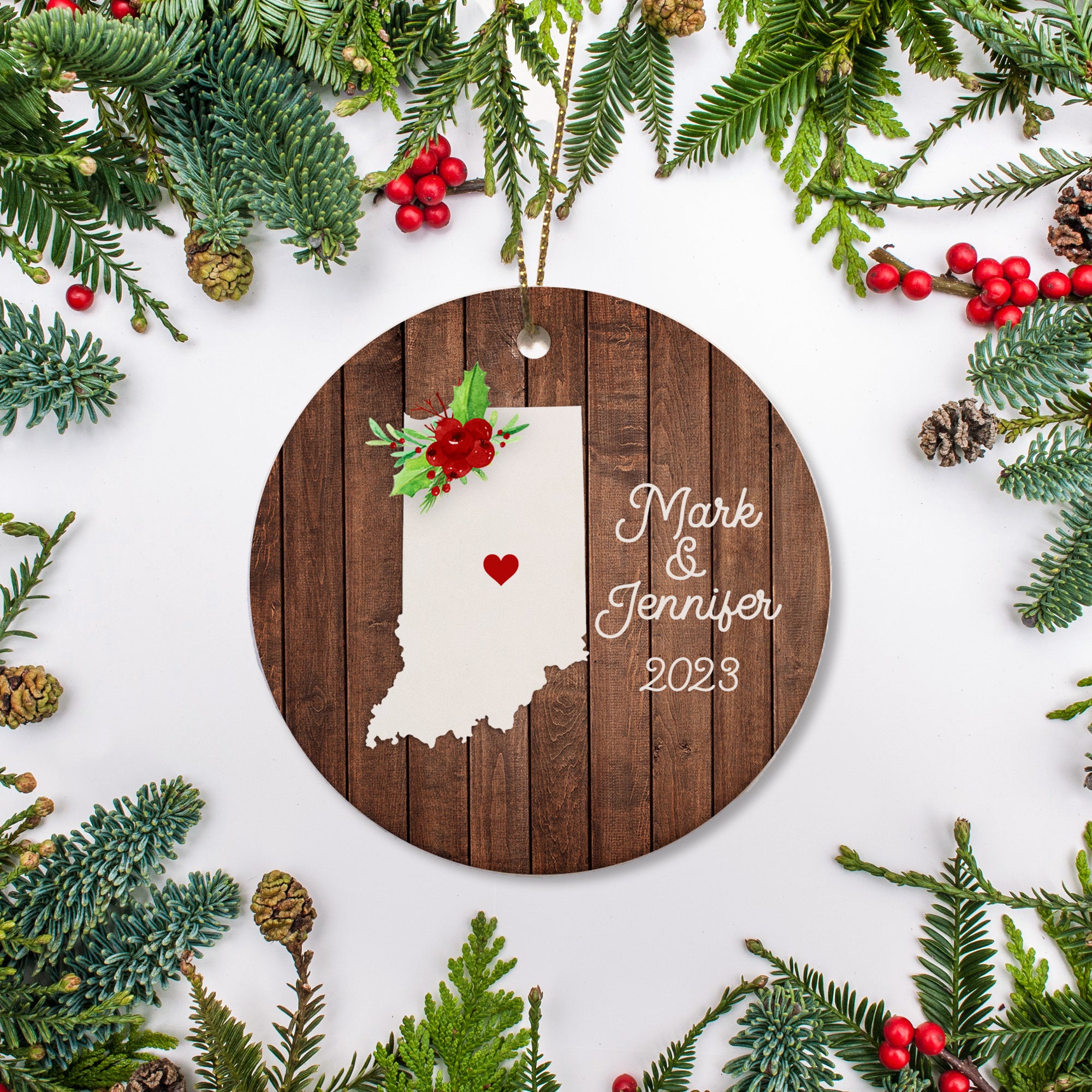 Indiana state christmas ornament. Personalized with your name, city, and year. Ceramic keepsake ornament with a gold hanging string. Great for a college student, new home owners, just moved, or vacation memory