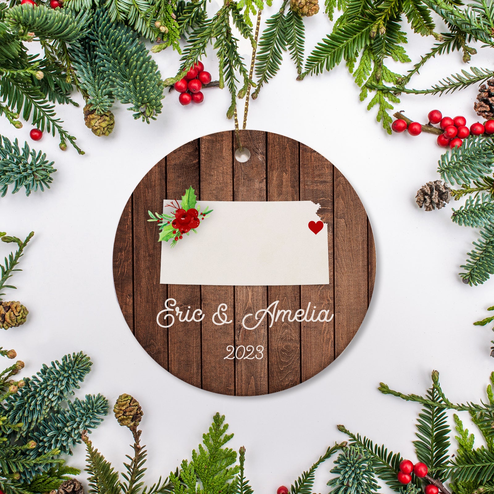 Kansas state christmas ornament. Personalized with your name, city, and year. Ceramic keepsake ornament with a gold hanging string. Great for a college student, new home owners, just moved, or vacation memory