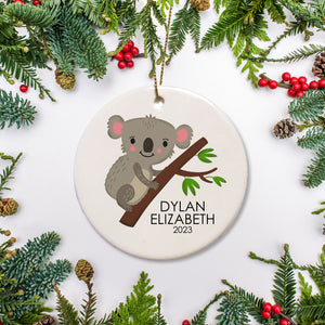 Koala Bear Christmas ornament, personalized with your child's name and the year. Option to include a personal message on the back, ceramic, comes with gold hanging string and a free gift box