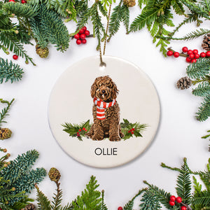Personalized Pet christmas ornament, featuring a brown labradoodle doodle on a bed of holly, white ceramic ornament