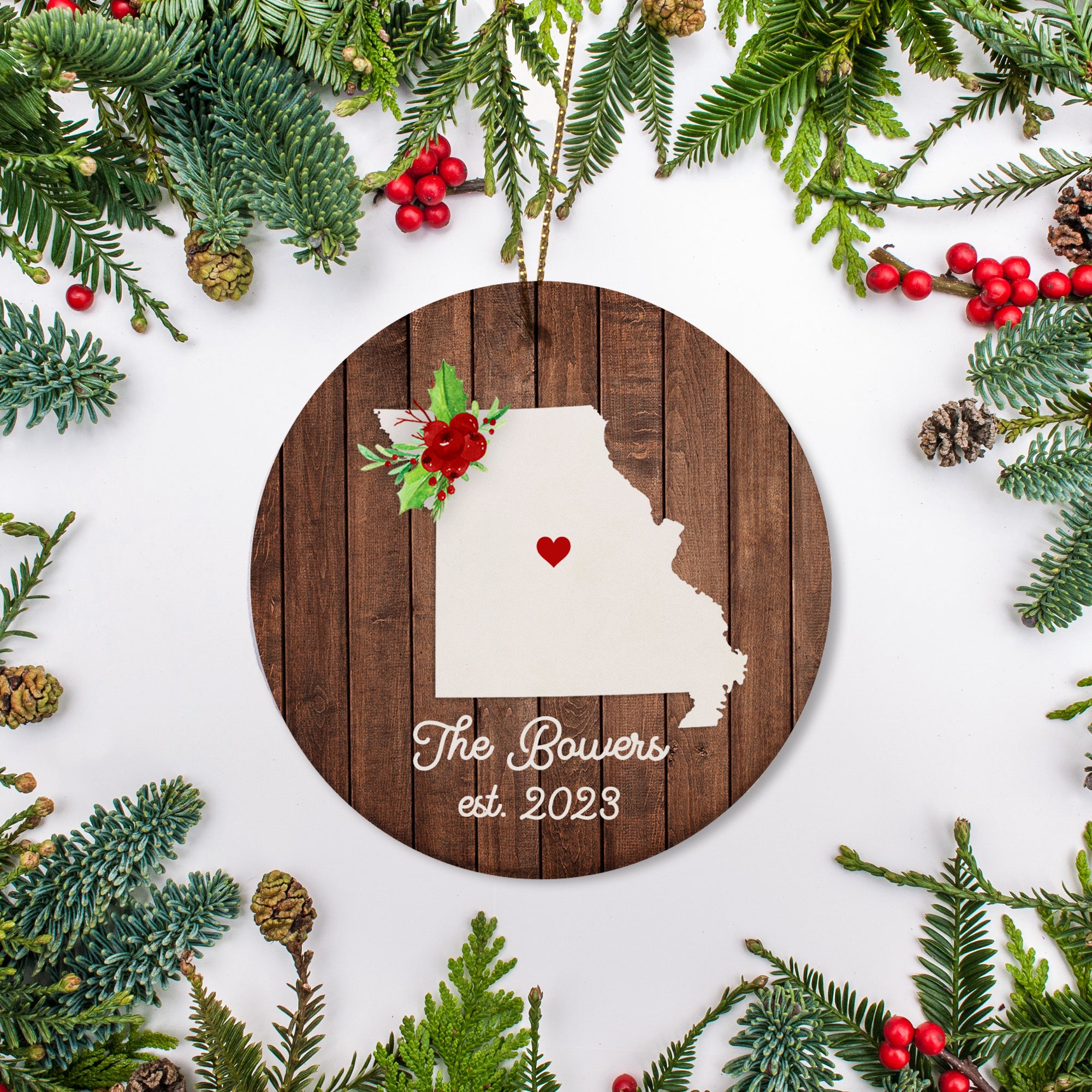 Missouri state christmas ornament. Personalized with your name, city, and year. Ceramic keepsake ornament with a gold hanging string. Great for a college student, new home owners, just moved, or vacation memory