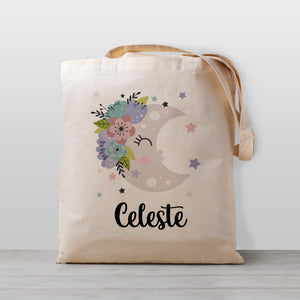 Moon Tote bag for kids, Moon has a cute kawaii face with flowers and stars. Personalized with your child&#39;s name. 100% natural cotton canvas. Printed with child-safe inks in our Nashville studio.