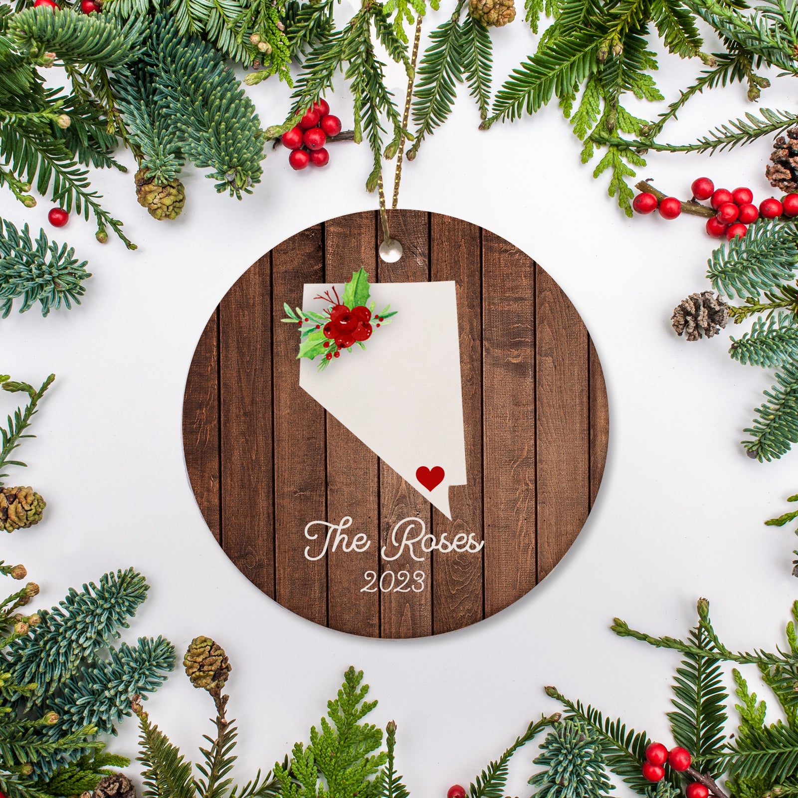 Nevada state christmas ornament. Personalized with your name, city, and year. Ceramic keepsake ornament with a gold hanging string. Great for a college student, new home owners, just moved, or vacation memory