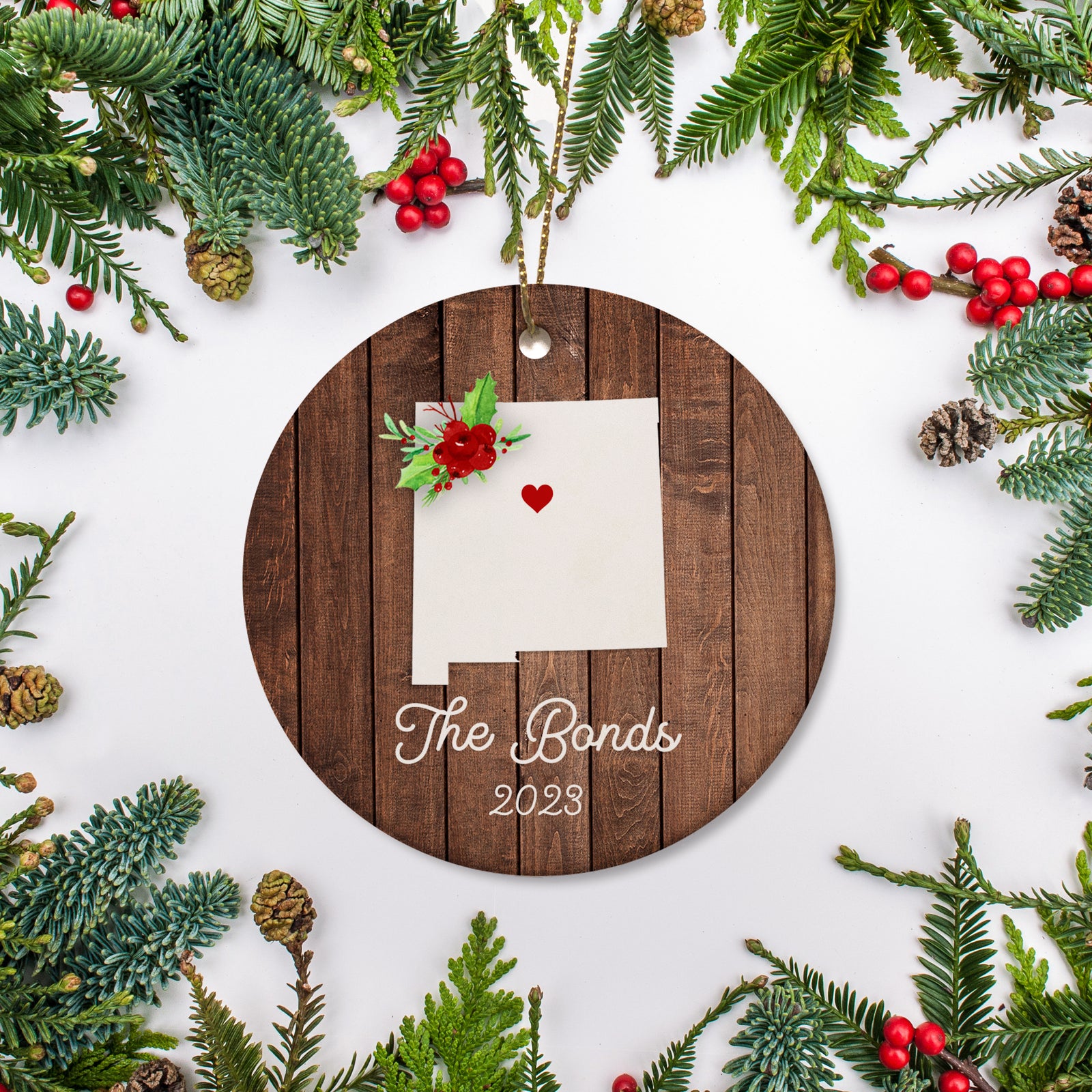 New Mexico state christmas ornament. Personalized with your name, city, and year. Ceramic keepsake ornament with a gold hanging string. Great for a college student, new home owners, just moved, or vacation memory