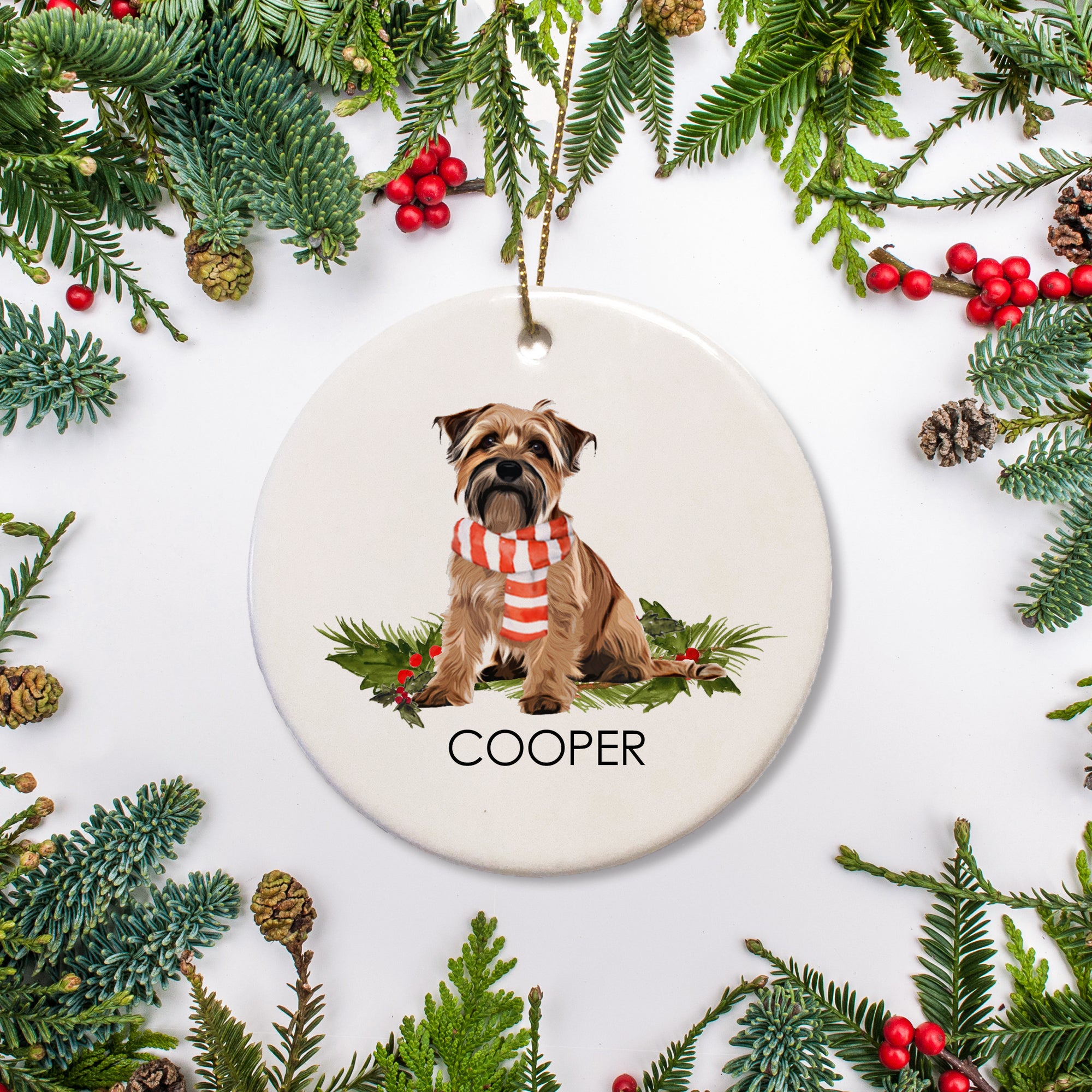 This Norfolk Terrier Christmas ornament showcases your dog, along with their name. An ideal present for pet lovers or a thoughtful memorial gift for a friend whose beloved pet has passed.