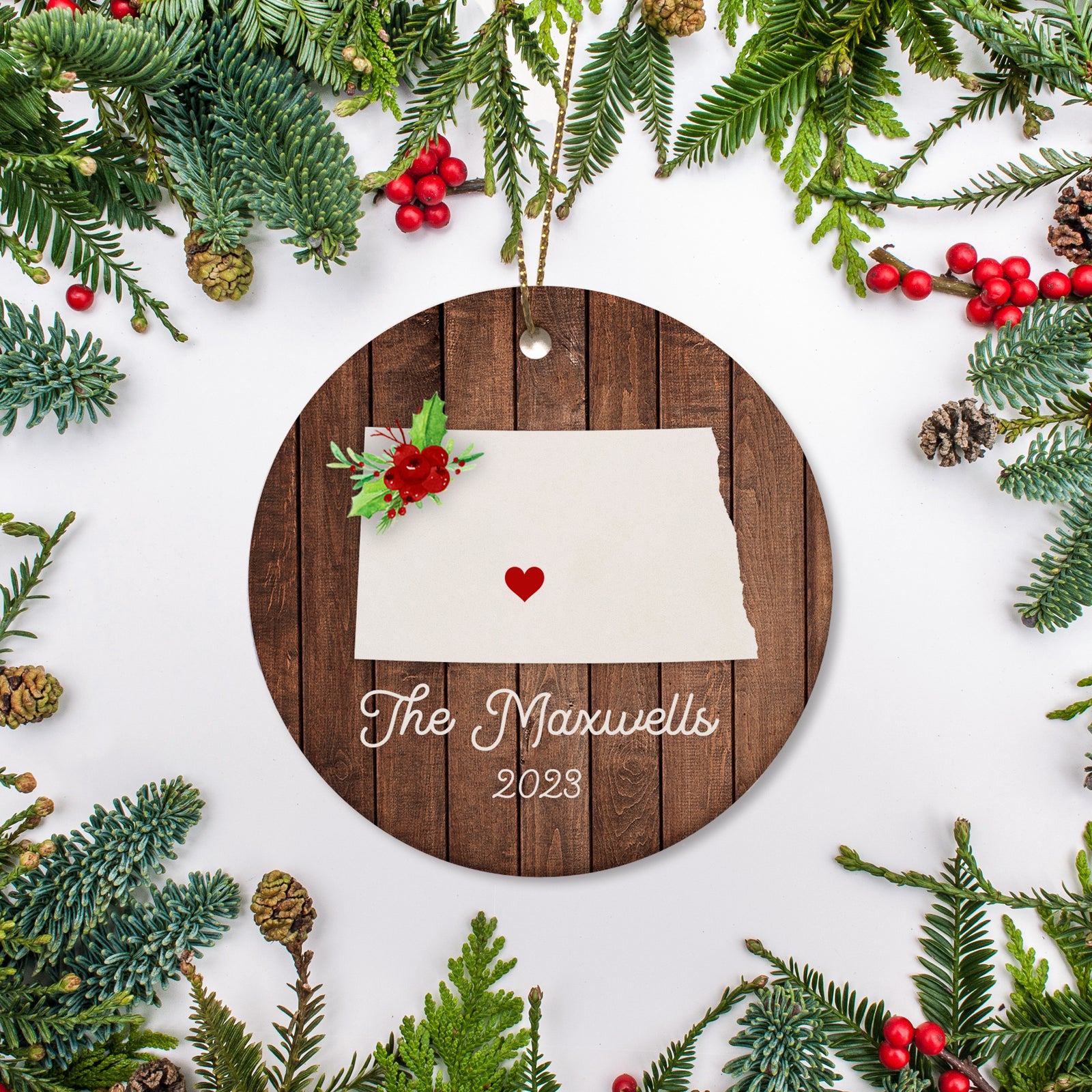 North Dakota state christmas ornament. Personalized with your name, city, and year. Ceramic keepsake ornament with a gold hanging string. Great for a college student, new home owners, just moved, or vacation memory