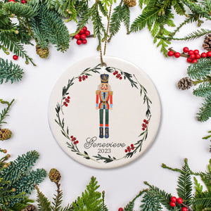 Personalized Christmas Ornament featuring the nutcracker from the Nutcracker performance - Personalized with name and year of your choice - surrounded by simple holiday wreath | PIPSY.COM