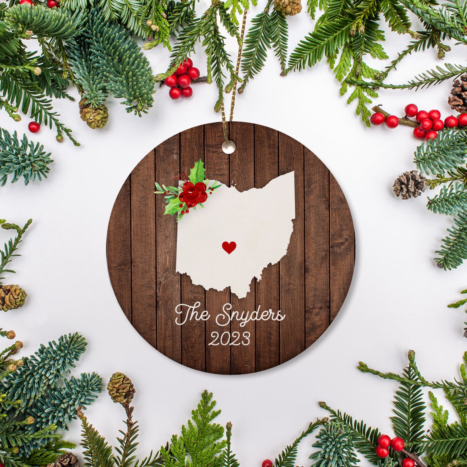 Ohio state christmas ornament. Personalized with your name, city, and year. Ceramic keepsake ornament with a gold hanging string. Great for a college student, new home owners, just moved, or vacation memory