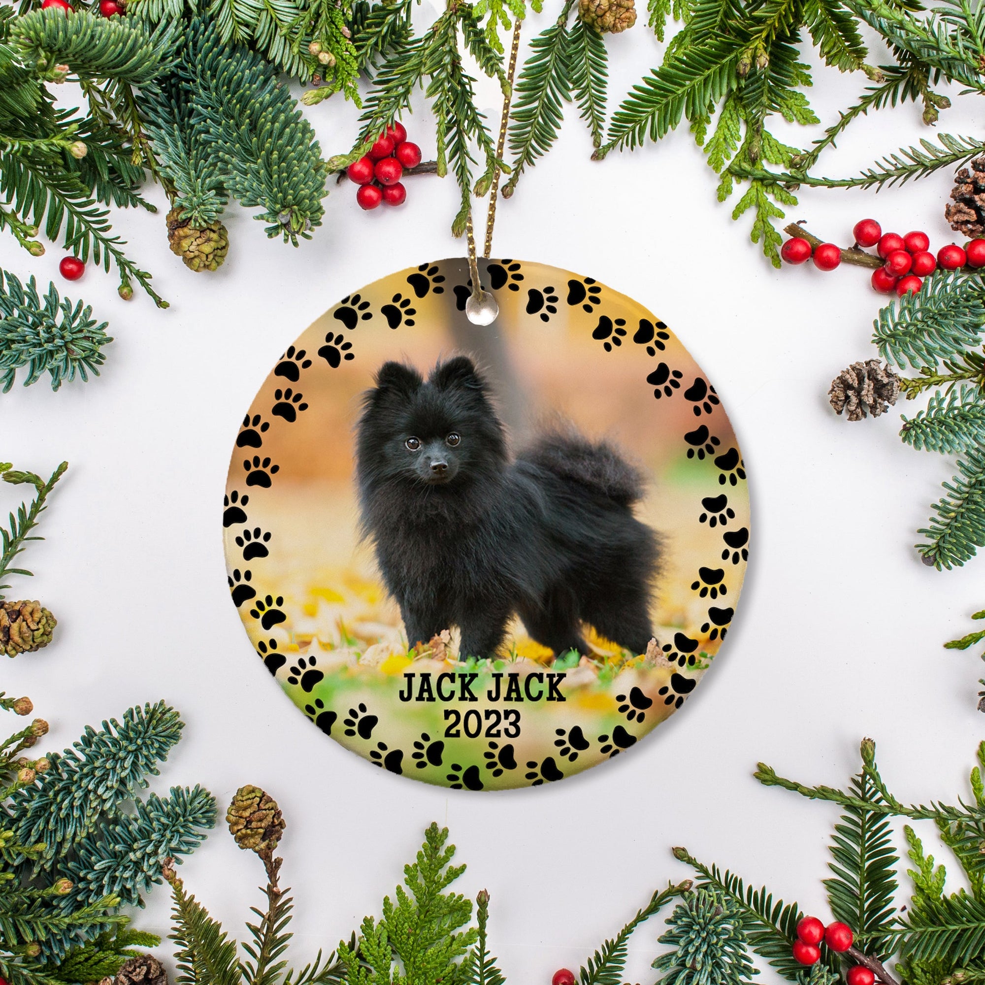 Photo ornament for dog or cat. High quality ceramic ornament with a paw print wreath
