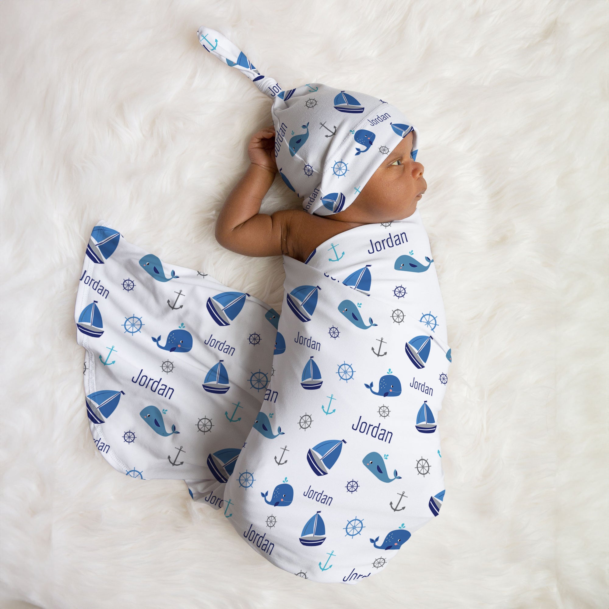 Whales and Boats Swaddle Set from Pipsy, stretchy soft jersey knit. Colors can be cusotmized upon request, matching knotted beanie available