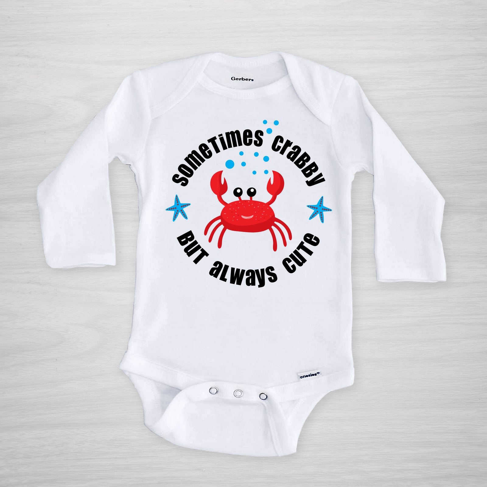 Our Sometimes Crabby Onesie is just the right pick for crabby cuties everywhere! This Gerber Onesie® is made with 100% cotton for softness and comfort and features a vibrant crab design with the phrase "Sometimes Crabby But Always Cute". Great for keeping your little one comfy and stylish! Short Sleeved