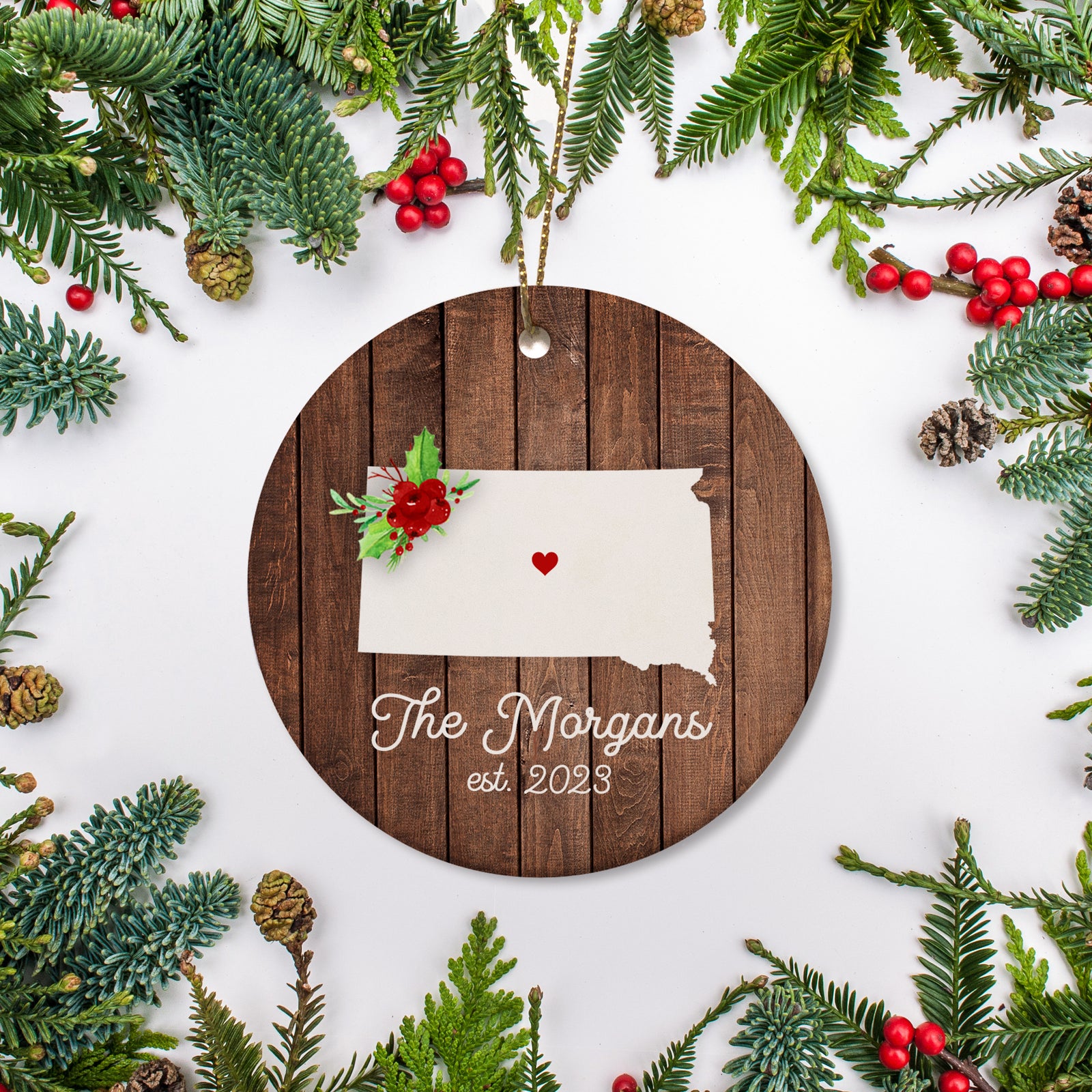 South Dakota state christmas ornament. Personalized with your name, city, and year. Ceramic keepsake ornament with a gold hanging string. Great for a college student, new home owners, just moved, or vacation memory