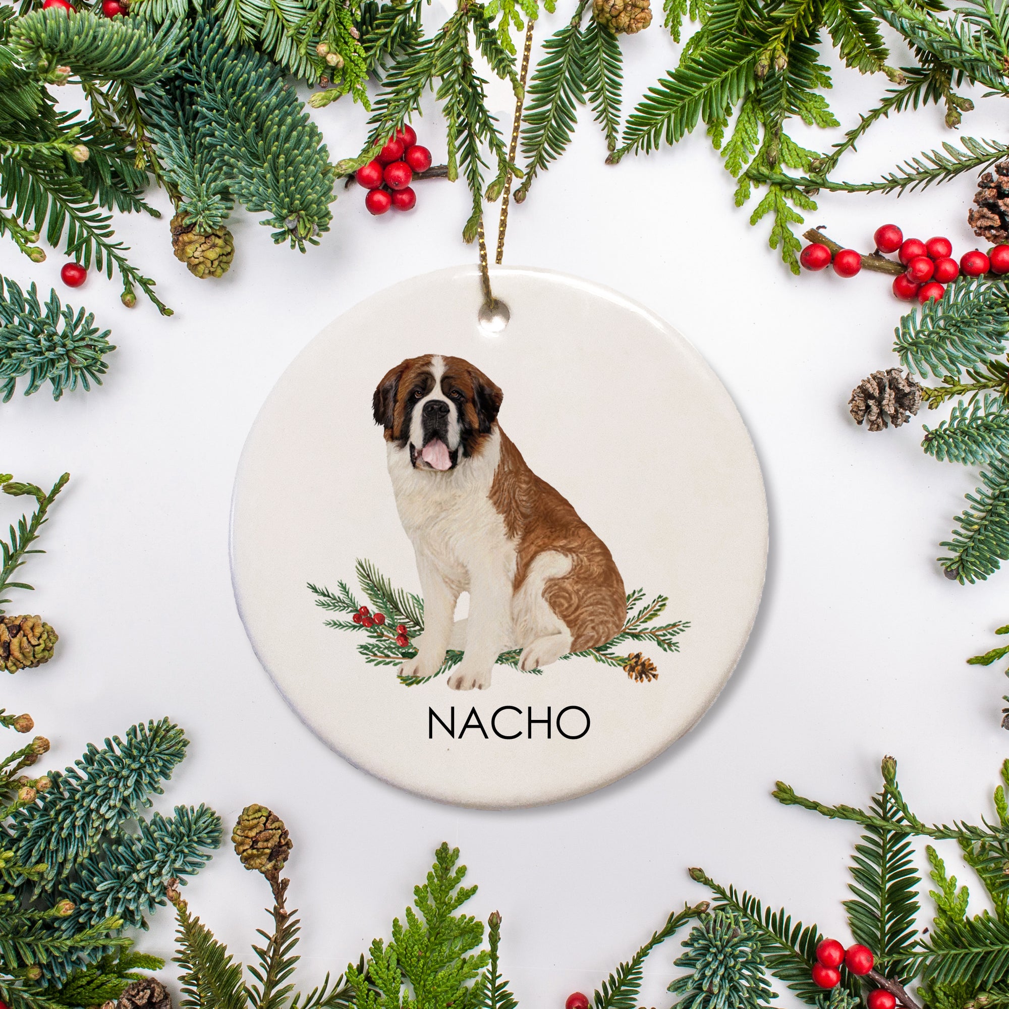 This is a personalized Christmas ornament in ceramic of a St. Bernard featuring the year of your choice.