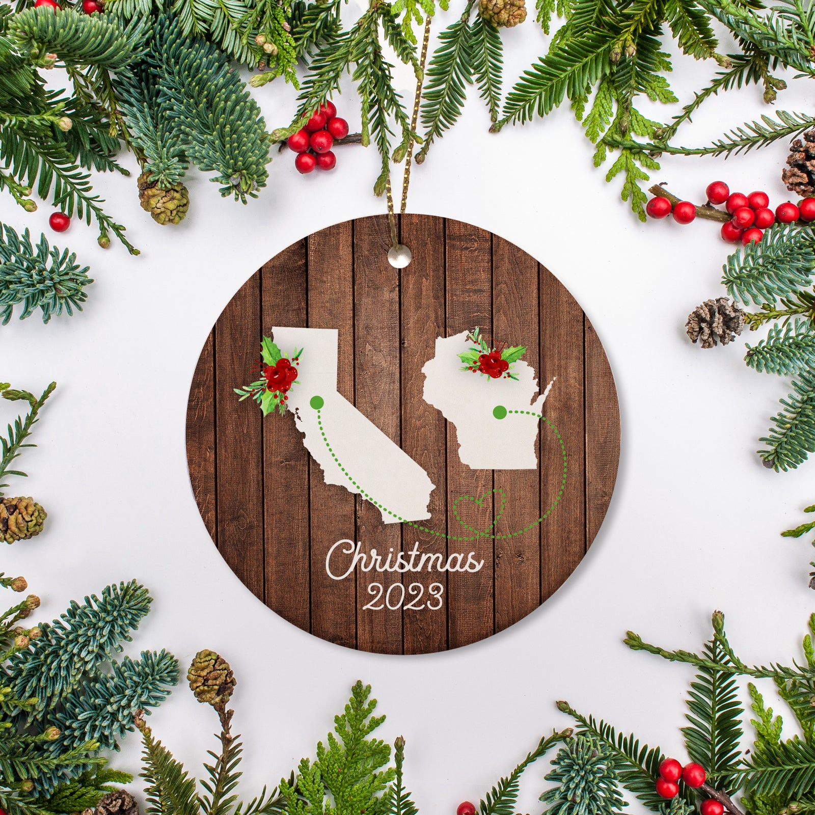 state to state christmas ornament. Personalized with your name, city, and year. Ceramic keepsake ornament with a gold hanging string. Great for a college student, new home owners, just moved, or vacation memory