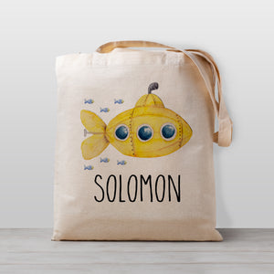 A submarine personalized tote bag, perfect for carrying your little one's stuff to preschool or kindergarten. This under the sea design even includes some cute fish following behind. Works great as a library book bag, too! 
