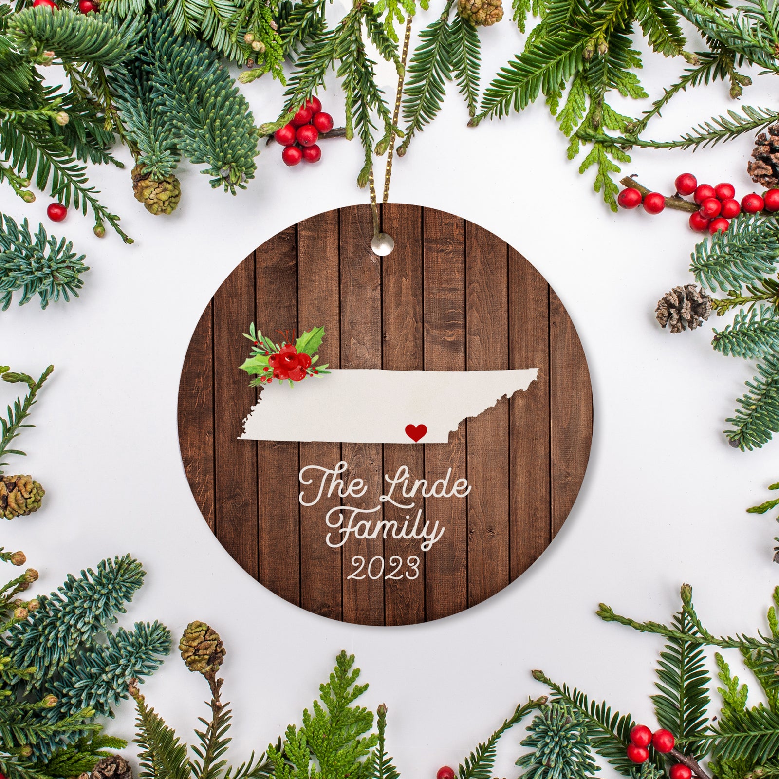 Tennessee state christmas ornament. Personalized with your name, city, and year. Ceramic keepsake ornament with a gold hanging string. Great for a college student, new home owners, just moved, or vacation memory