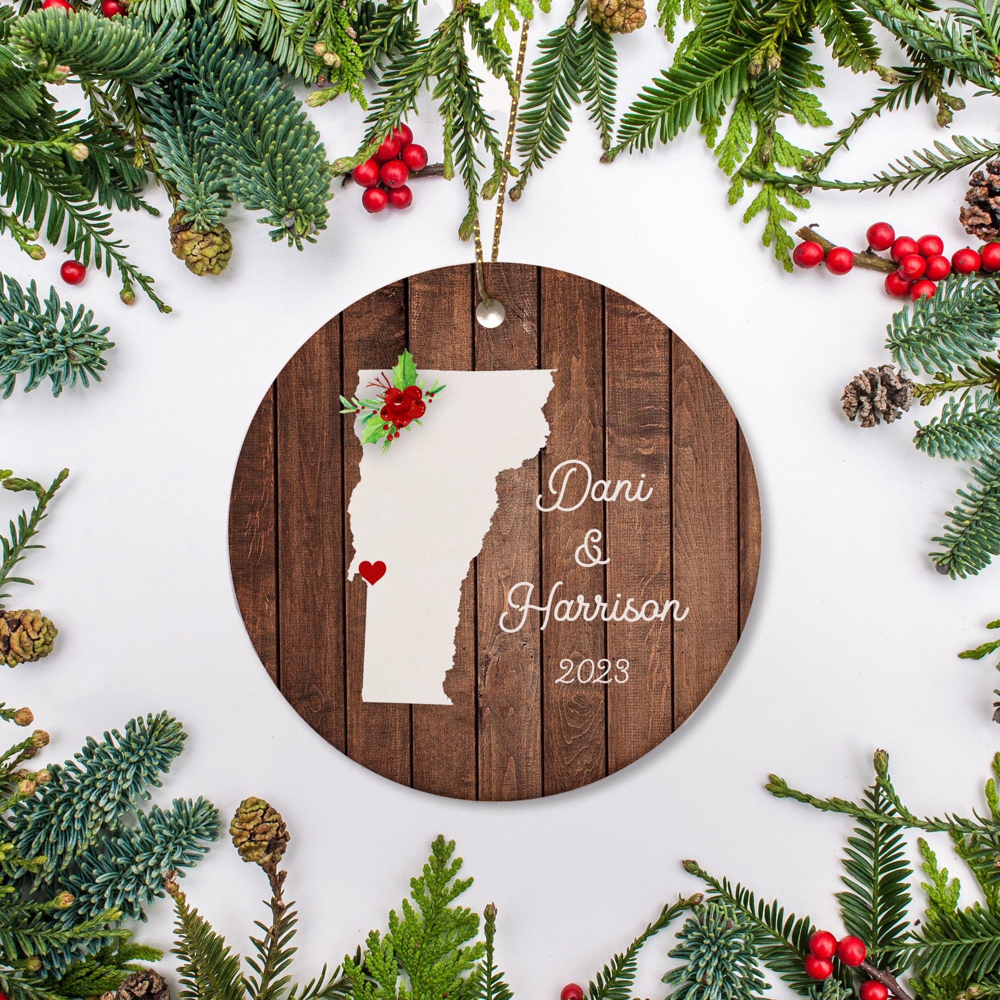 Vermont state christmas ornament. Personalized with your name, city, and year. Ceramic keepsake ornament with a gold hanging string. Great for a college student, new home owners, just moved, or vacation memory