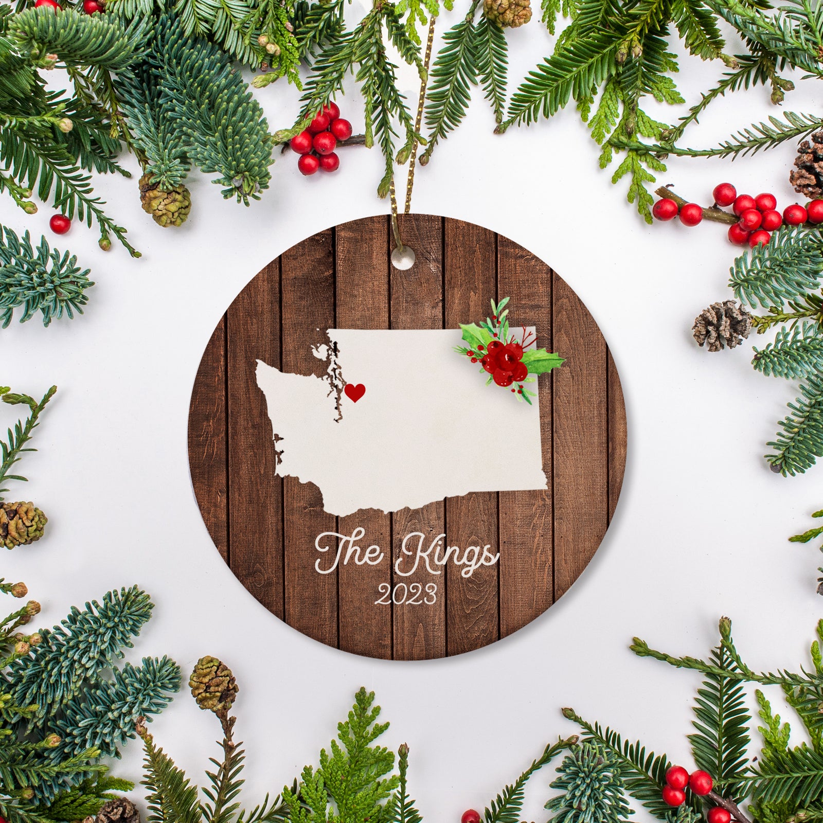 Washington state christmas ornament. Personalized with your name, city, and year. Ceramic keepsake ornament with a gold hanging string. Great for a college student, new home owners, just moved, or vacation memory
