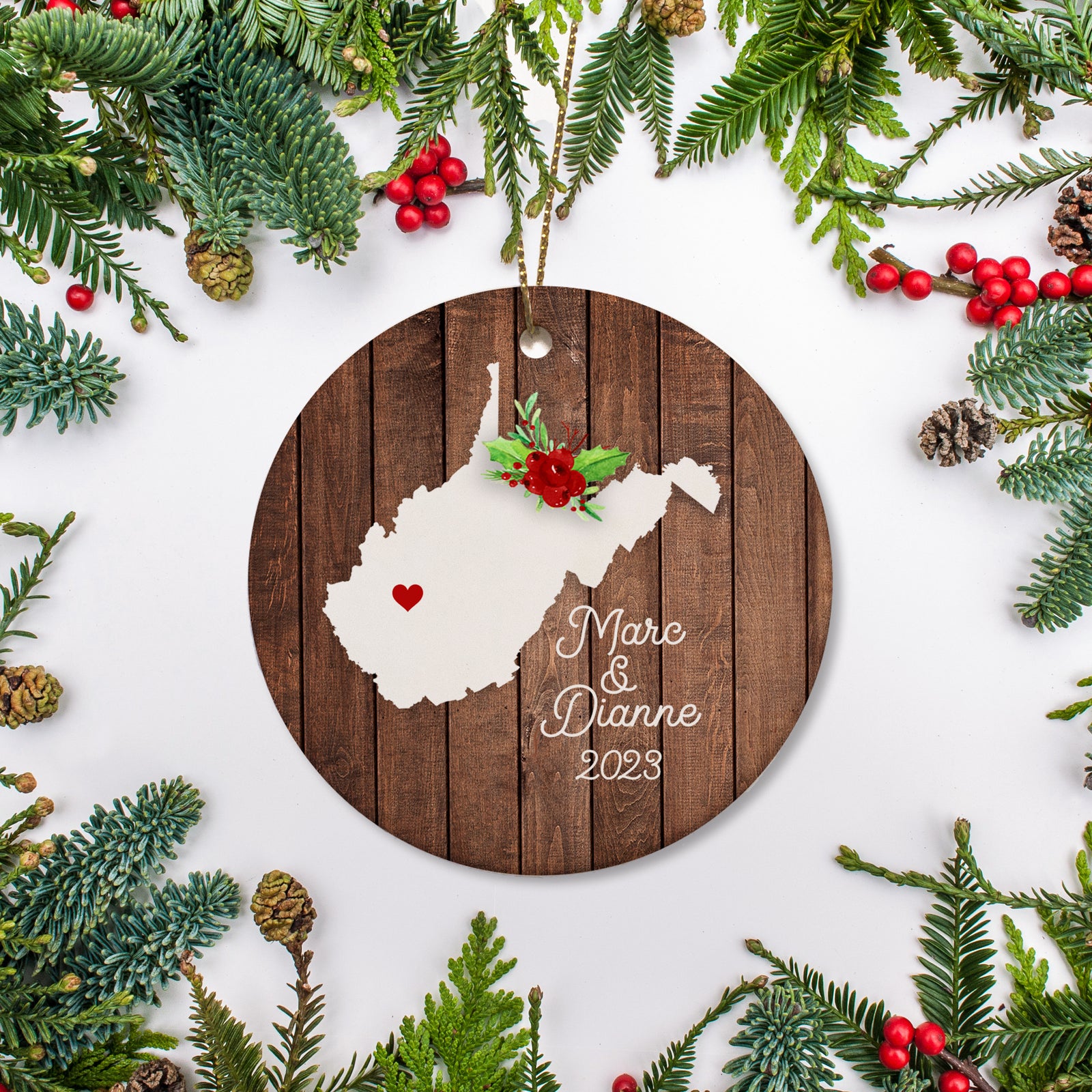 West Virginia state christmas ornament. Personalized with your name, city, and year. Ceramic keepsake ornament with a gold hanging string. Great for a college student, new home owners, just moved, or vacation memory