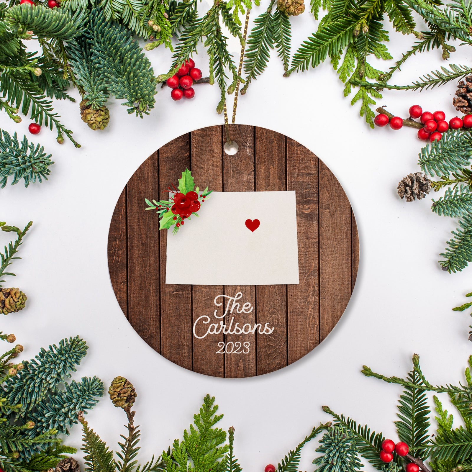Colorado state christmas ornament. Personalized with your name, city, and year. Ceramic keepsake ornament with a gold hanging string. Great for a college student, new home owners, just moved, or vacation memory