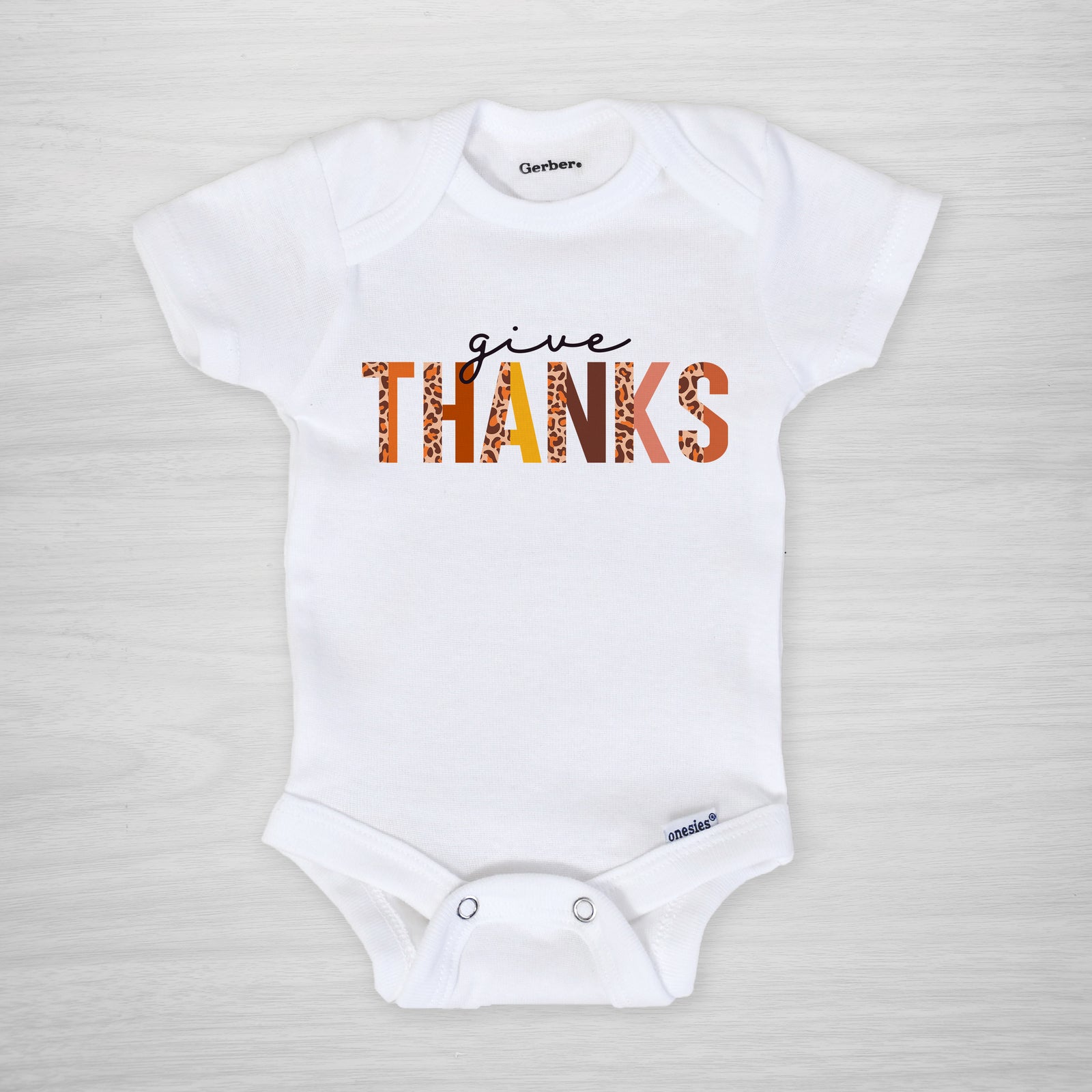 Give Thanks Onesie for Thanksgiving. Cute design with leopard accents, long sleeved