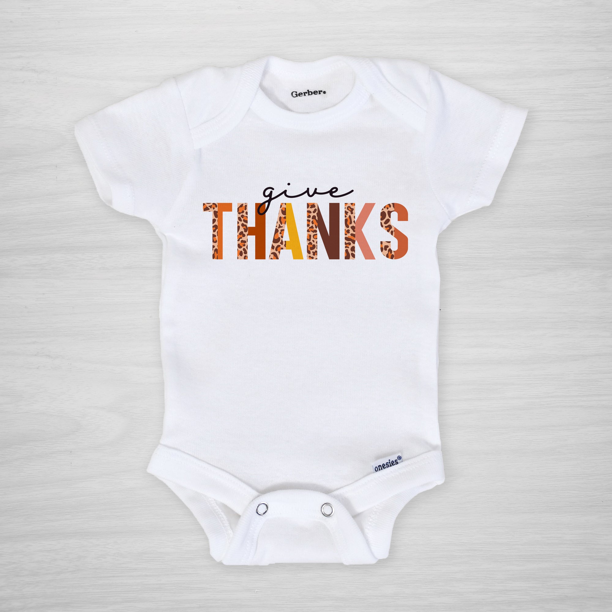 Give Thanks Onesie for Thanksgiving. Cute design with leopard accents, long sleeved