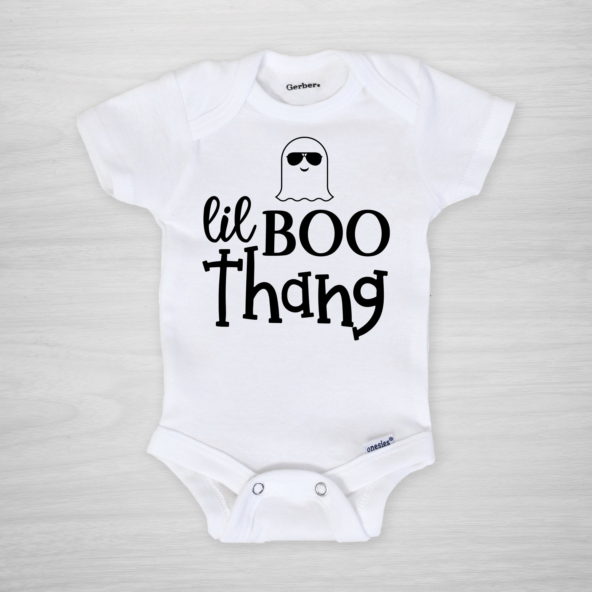 lil boo thang onesie with a cute ghost in aviator sunglasses. Printed in our Nashville studio short sleeved