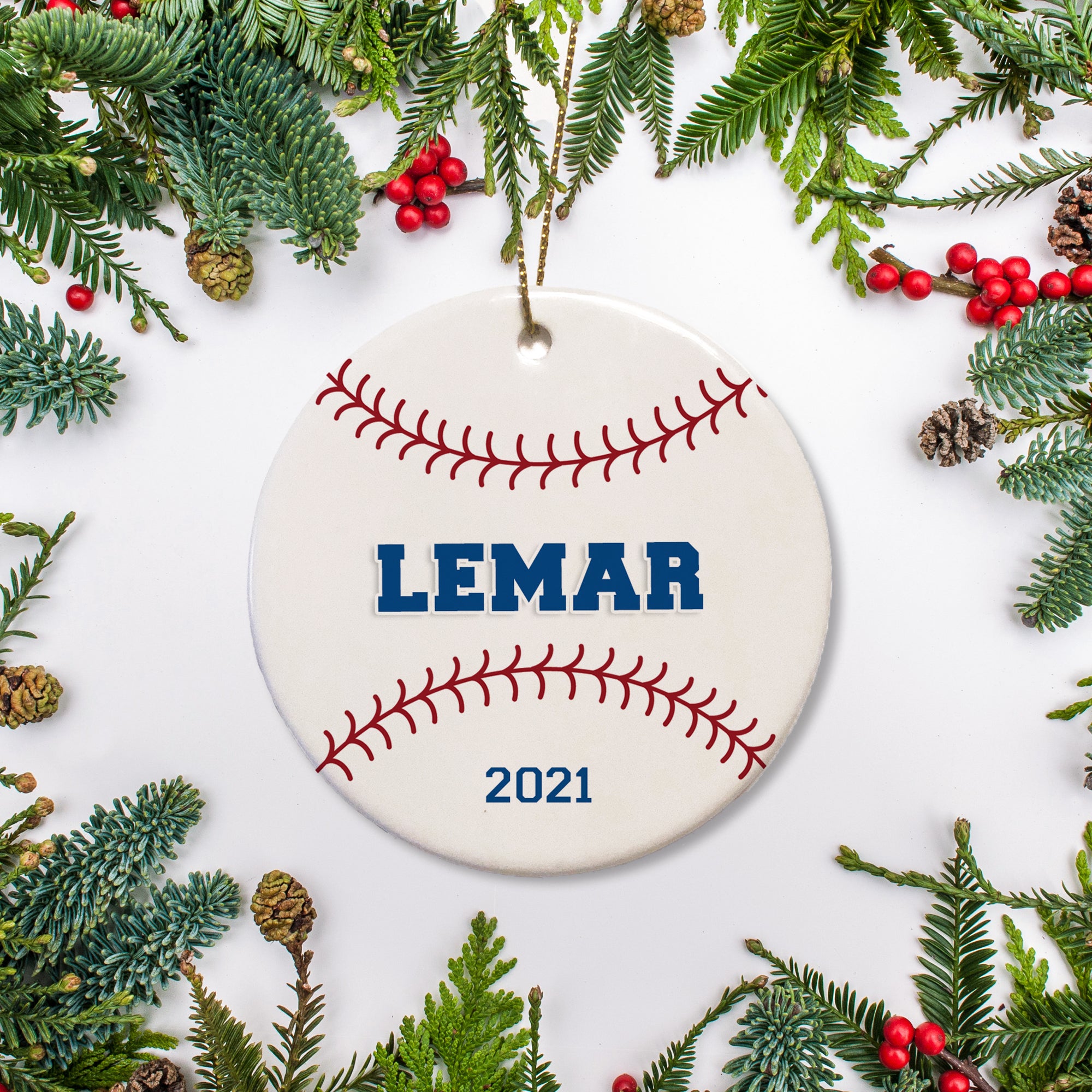 White ceramic Christmas Ornament with baseball stitches making it just like a baseball. Personalize with name and year of your choice. | PIPSY.COM